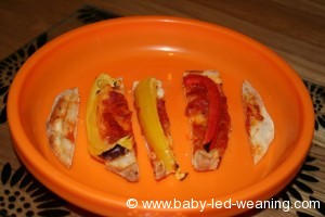Baby pizza cut into strips - the outside two were a bit too crispy and sharp, we didn't offer them to Art